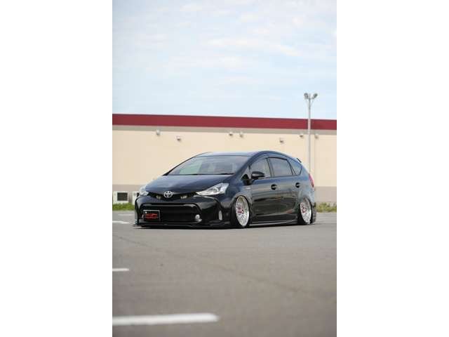 プリウスα　Ｓツーリングセレクション入庫しました！カスタム車両です！エアサス　ＷＯＲＫ　社外マフラー　社外ナビ　リアモニター　シートカバー　カスタム多数の１台です！お気軽にお問い合わせください！