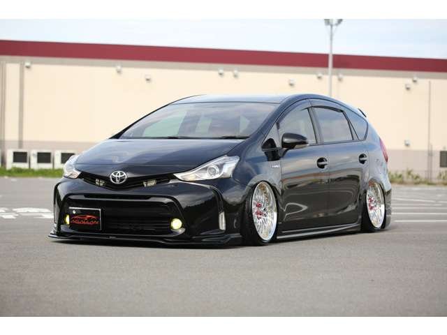 プリウスα　Ｓツーリングセレクション入庫しました！カスタム車両です！エアサス　ＷＯＲＫ　社外マフラー　社外ナビ　リアモニター　シートカバー　カスタム多数の１台です！お気軽にお問い合わせください！